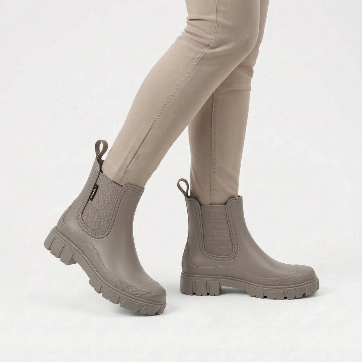 Women's Chelsea rain boots with elastic side panels and chunky lug soles