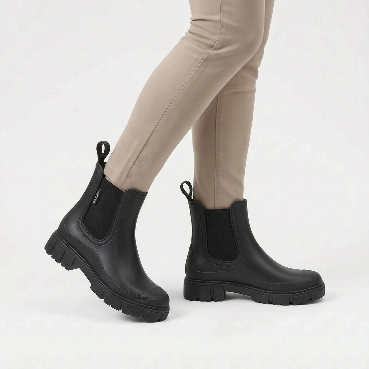 Women's Chelsea rain boots with elastic side panels and chunky lug soles
