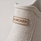 Women's ankle Chelsea rain boots with elasticated side panels and treaded soles