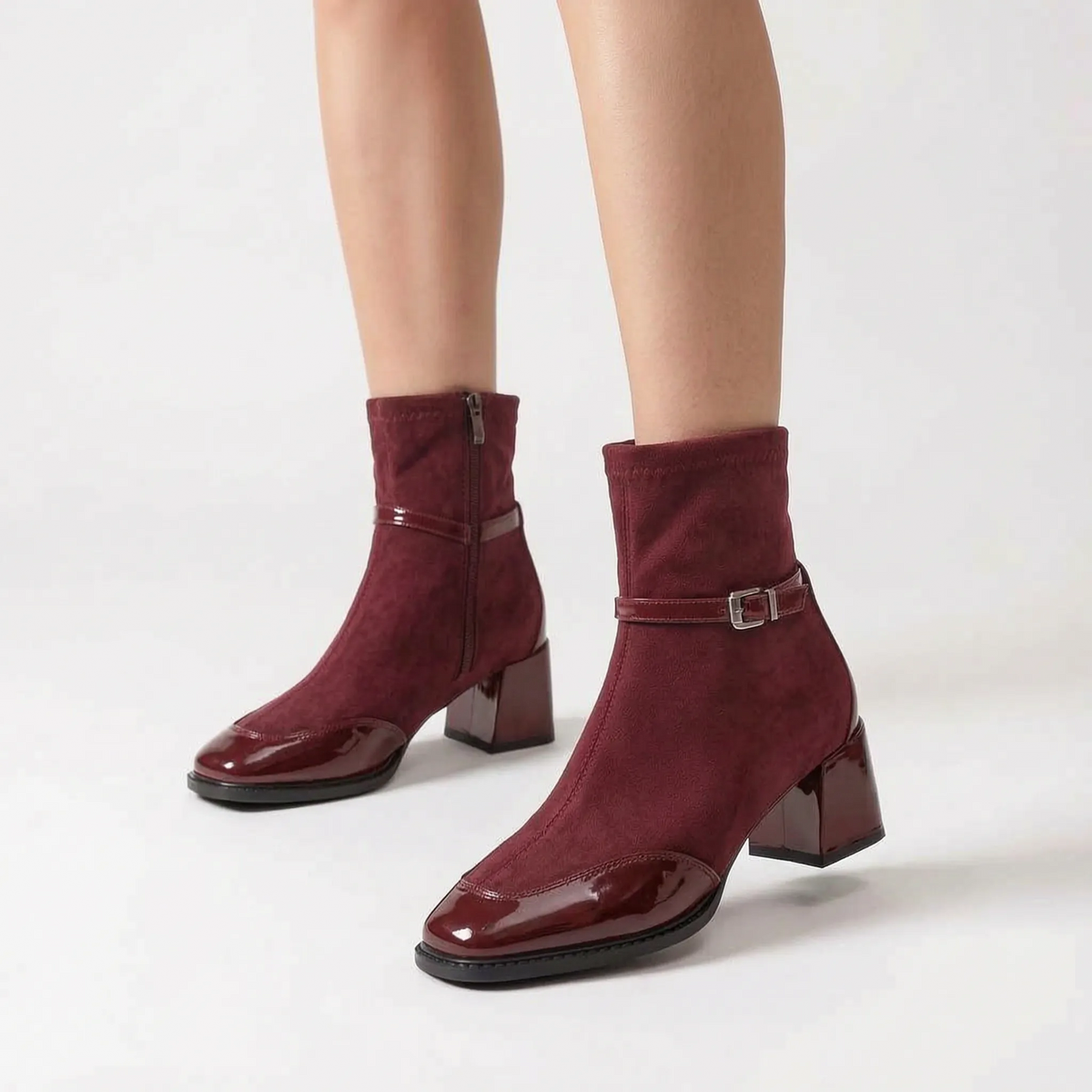 Women's heeled ankle boots with square toes, buckle straps and glossy toe panels