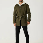 Green men's short trench coat with long sleeves, button front and flap pockets