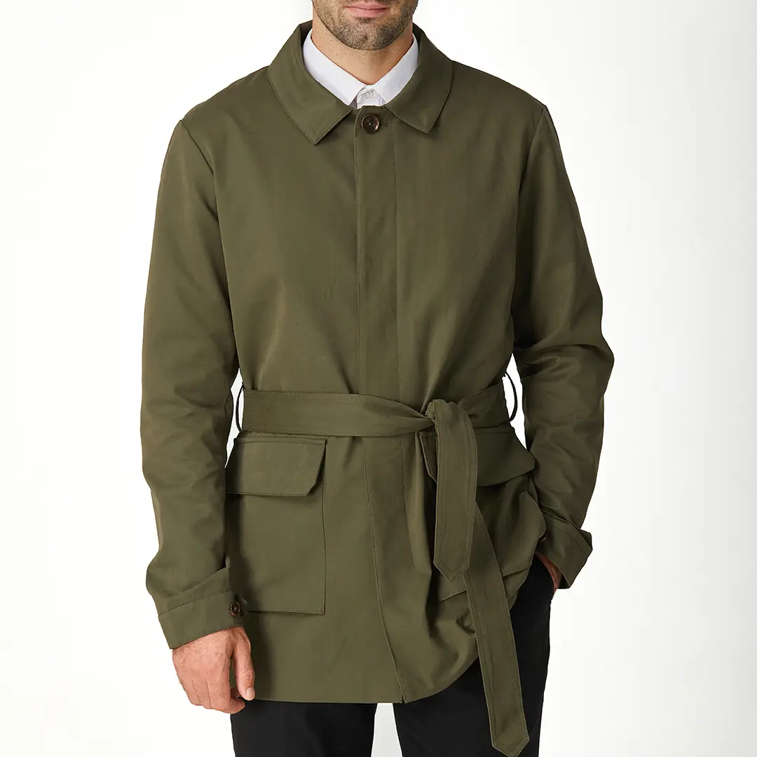 Green men's short trench coat with long sleeves, button front and flap pockets