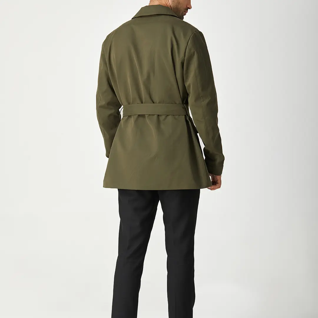 Green men's short trench coat with long sleeves, button front and flap pockets