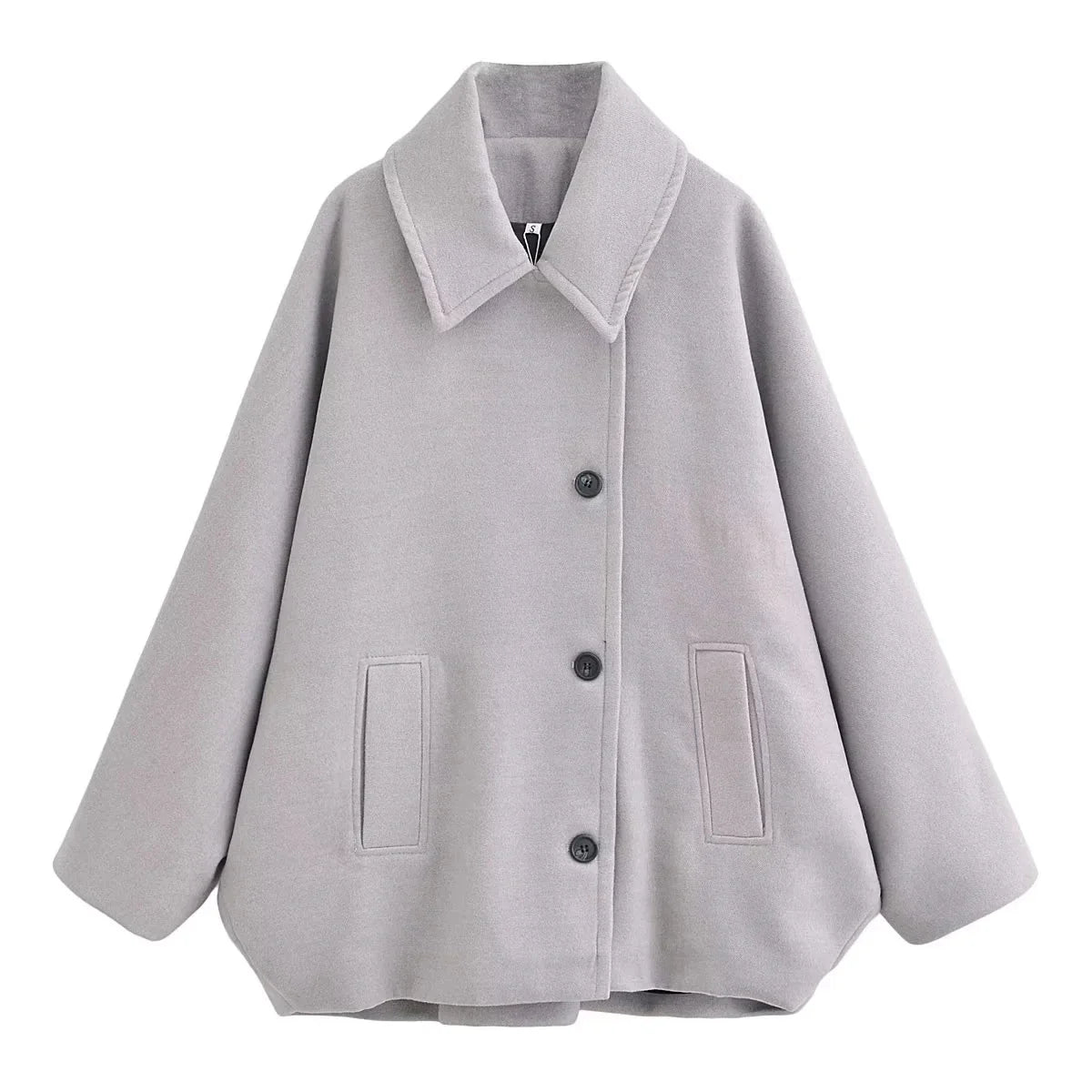 Women's oversized short coat with wide collar, long sleeves, buttons and front pockets