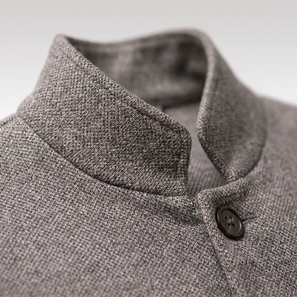 Men's textured knit jacket with mandarin collar, long sleeves, buttons and patch pockets