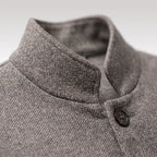 Men's textured knit jacket with mandarin collar, long sleeves, buttons and patch pockets