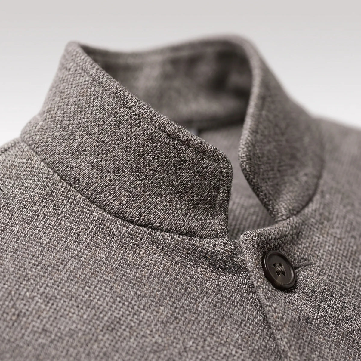 Men's textured knit jacket with mandarin collar, long sleeves, buttons and patch pockets