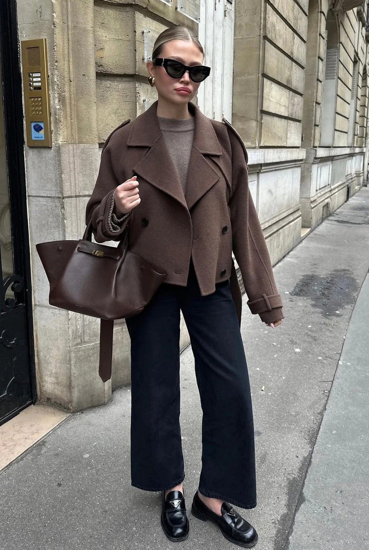 Women's brown cropped jacket with lapels, buttons and long belt