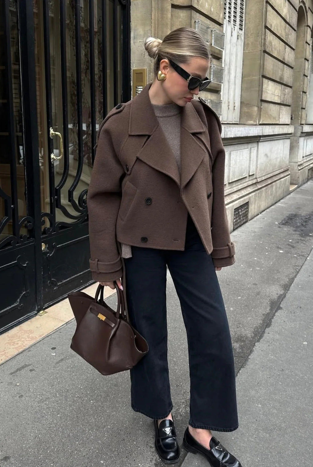 Women's brown cropped jacket with lapels, buttons and long belt