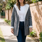 Women's hooded duffle coat with toggle fastenings and contrasting lining