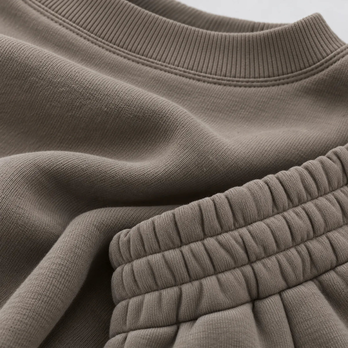 Women's cropped crew-neck sweatshirt and high-waisted jogger tracksuit set