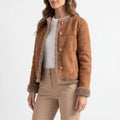 Women's brown structured jacket with fluffy trim and gold-tone buttons