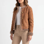 Women's brown structured jacket with fluffy trim and gold-tone buttons