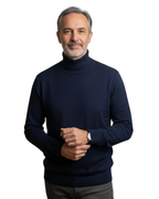 Men's plain ribbed turtleneck jumper folded on a surface