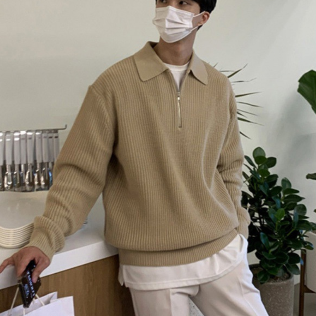 Men's ribbed quarter-zip sweater with collared neckline and long sleeves