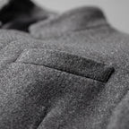 Men's tailored top coat with stand collar and button front