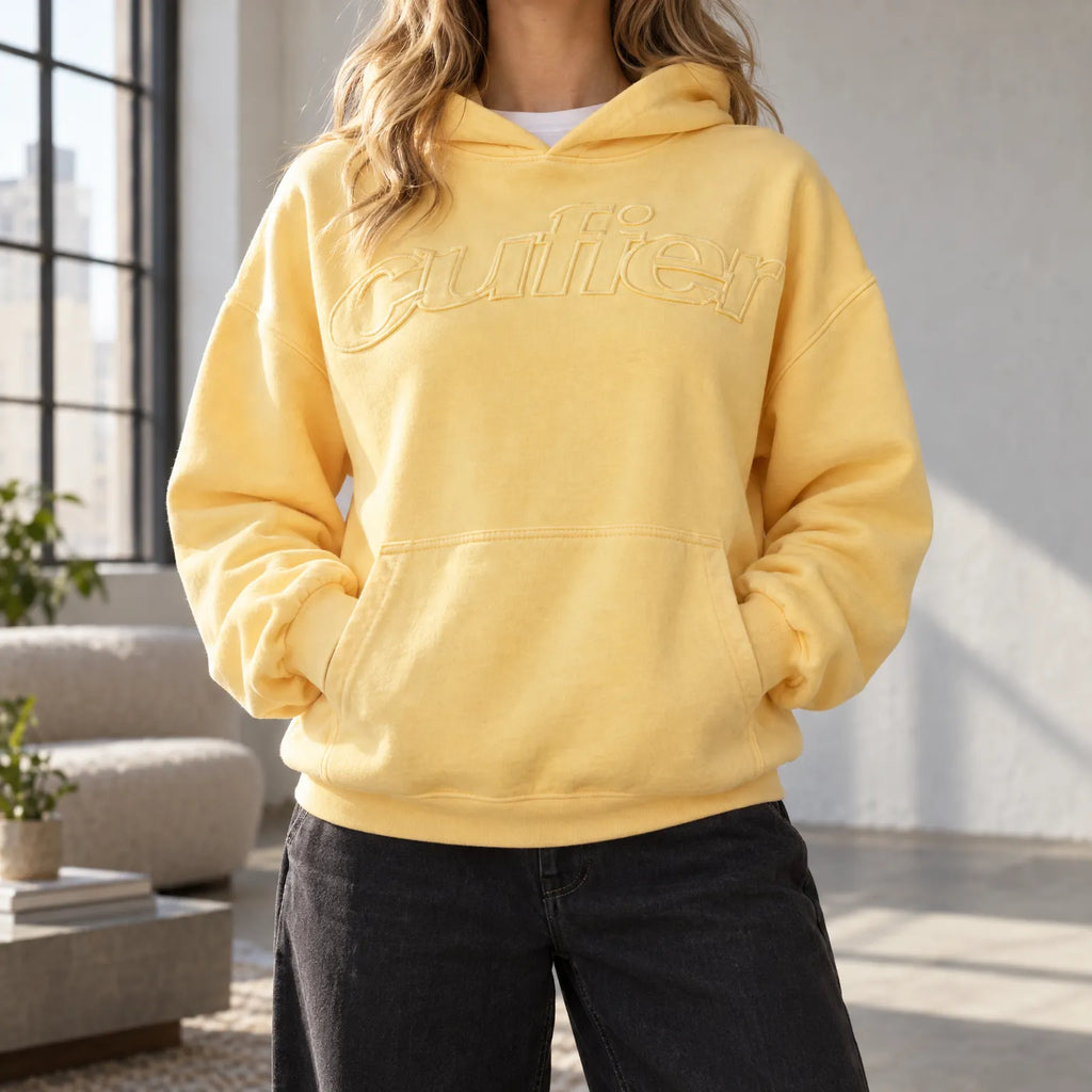 Women's oversized hoodie with hood, raised chest text and kangaroo pocket