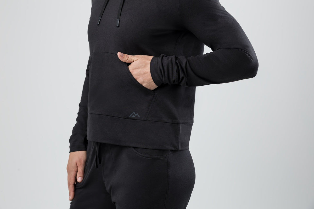 Women's long sleeve pullover hoodie with drawstring hood and front kangaroo pocket