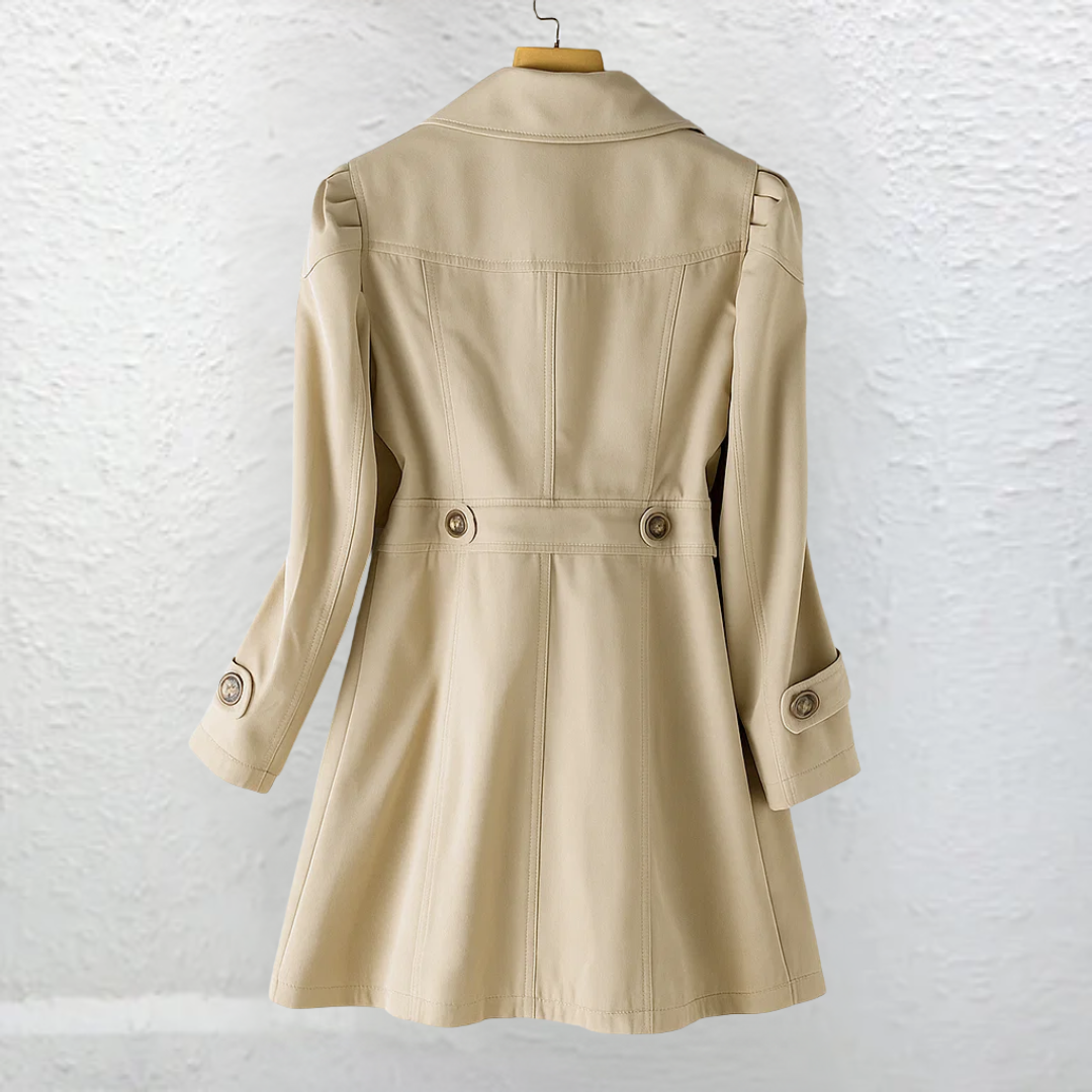 Women's vintage trench coat with notched lapels, long sleeves and button fastening