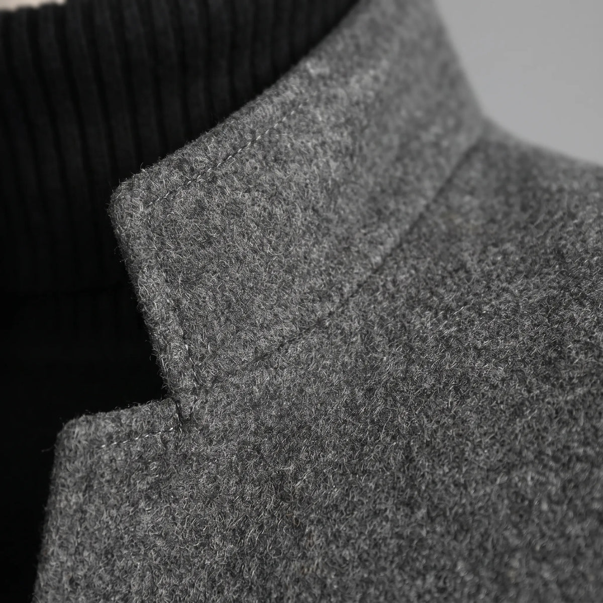 Men's tailored stand collar coat with button front and long sleeves