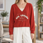 Women's cropped V-neck sweatshirt with graphic chest print and long sleeves