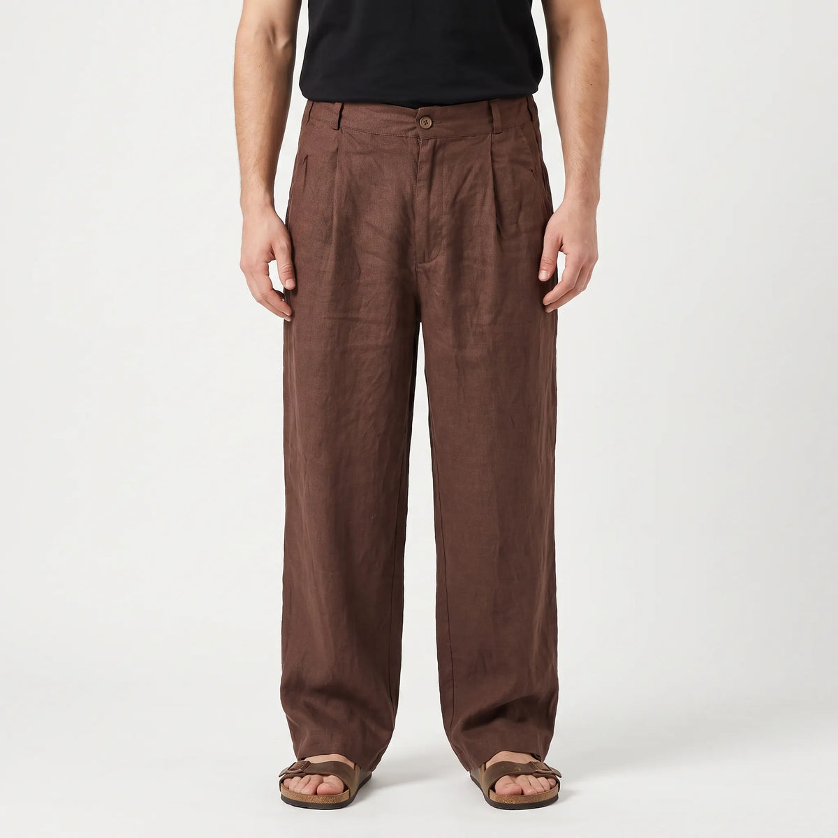 Men's brown wide leg trousers with pleated front and full-length legs