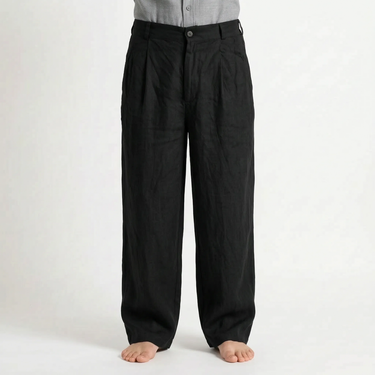 Men's brown wide leg trousers with pleated front and full-length legs