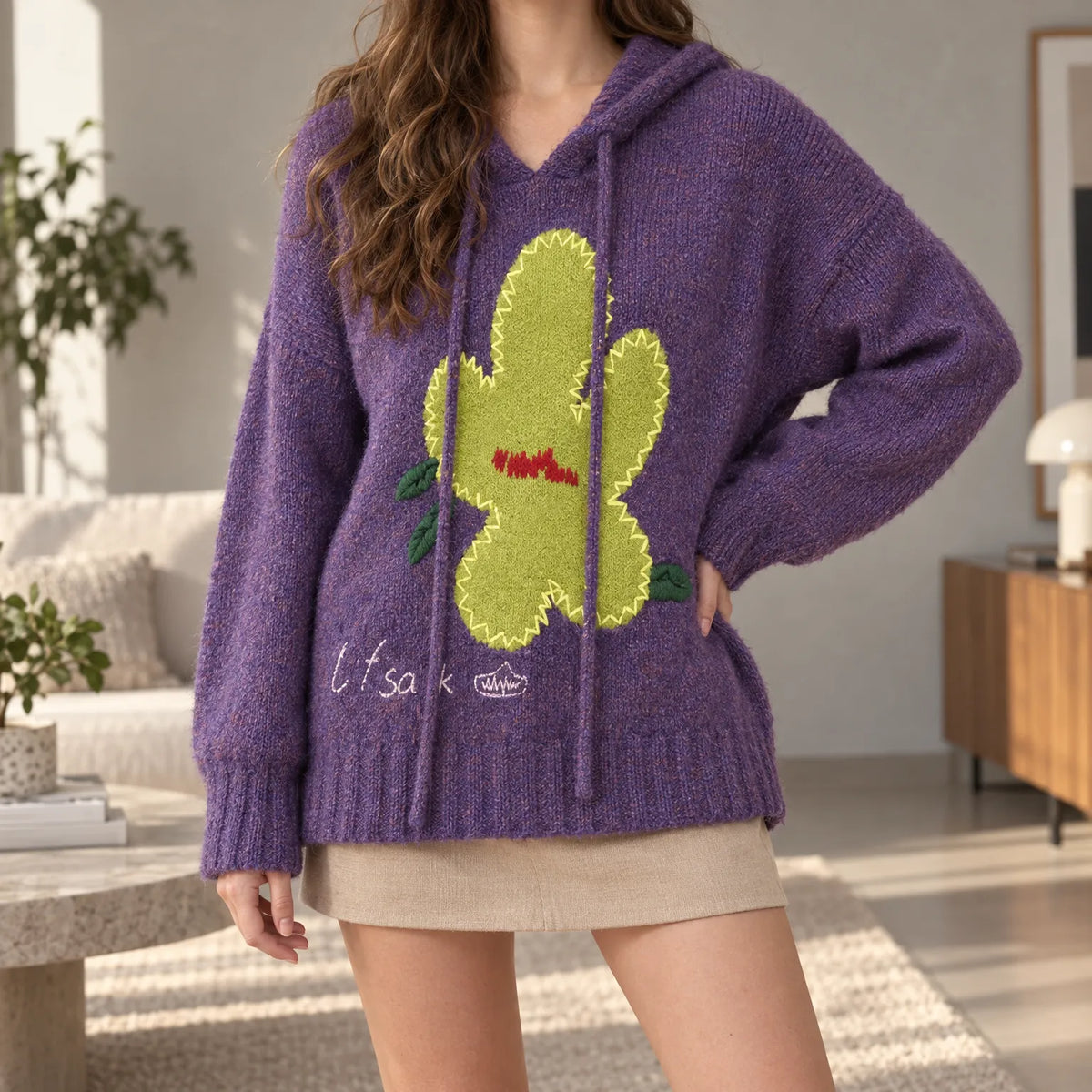 Women's purple knitted hoodie with a large cactus graphic and hood