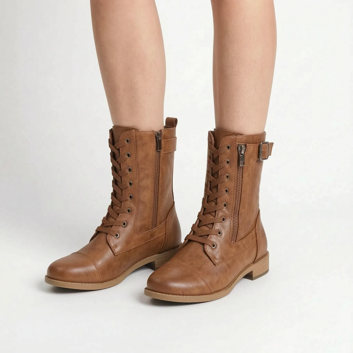 Women's mid-calf combat boots with lace-up fronts, side zips and buckle straps