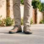 Men's low-top lace-up trainers with textured uppers and flat dark soles