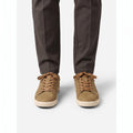 Men's low-top lace-up trainers with textured uppers and flat dark soles