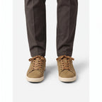 Men's low-top lace-up trainers with textured uppers and flat dark soles