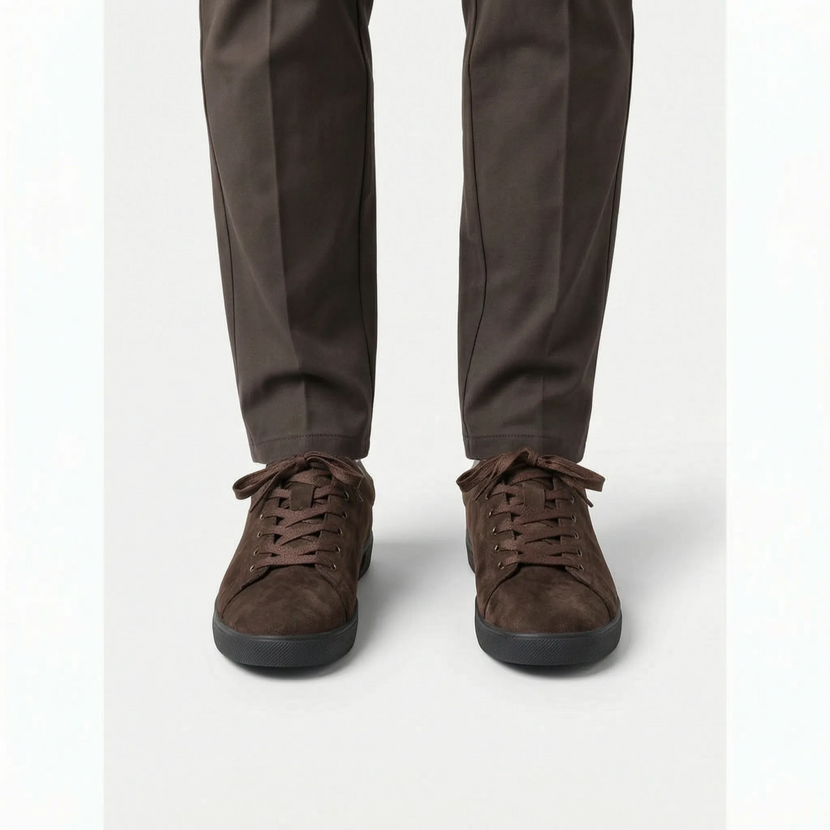 Men's low-top lace-up trainers with textured uppers and flat dark soles