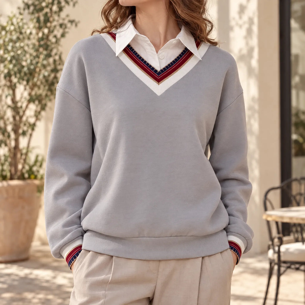 Women's grey sweatshirt with collared V-neck and striped trim