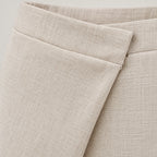 Women's high-waisted wide-leg trousers with an asymmetric wrap front