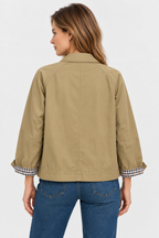 Women's short trench jacket with button front, patch pockets and checked turn-back cuffs