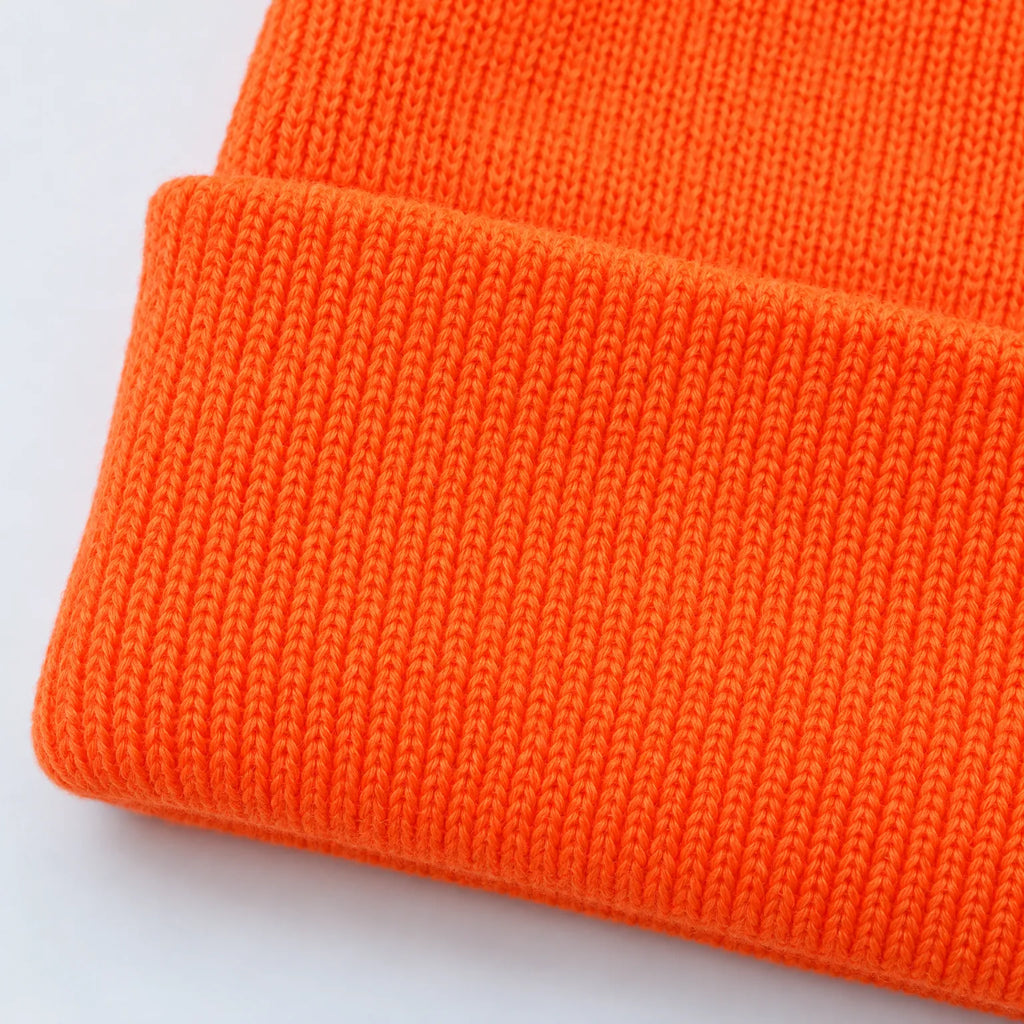 Ribbed knitted beanie hat with a turn-up cuff