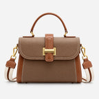 Structured crossbody handbag with flap clasp, top handle and wide shoulder strap