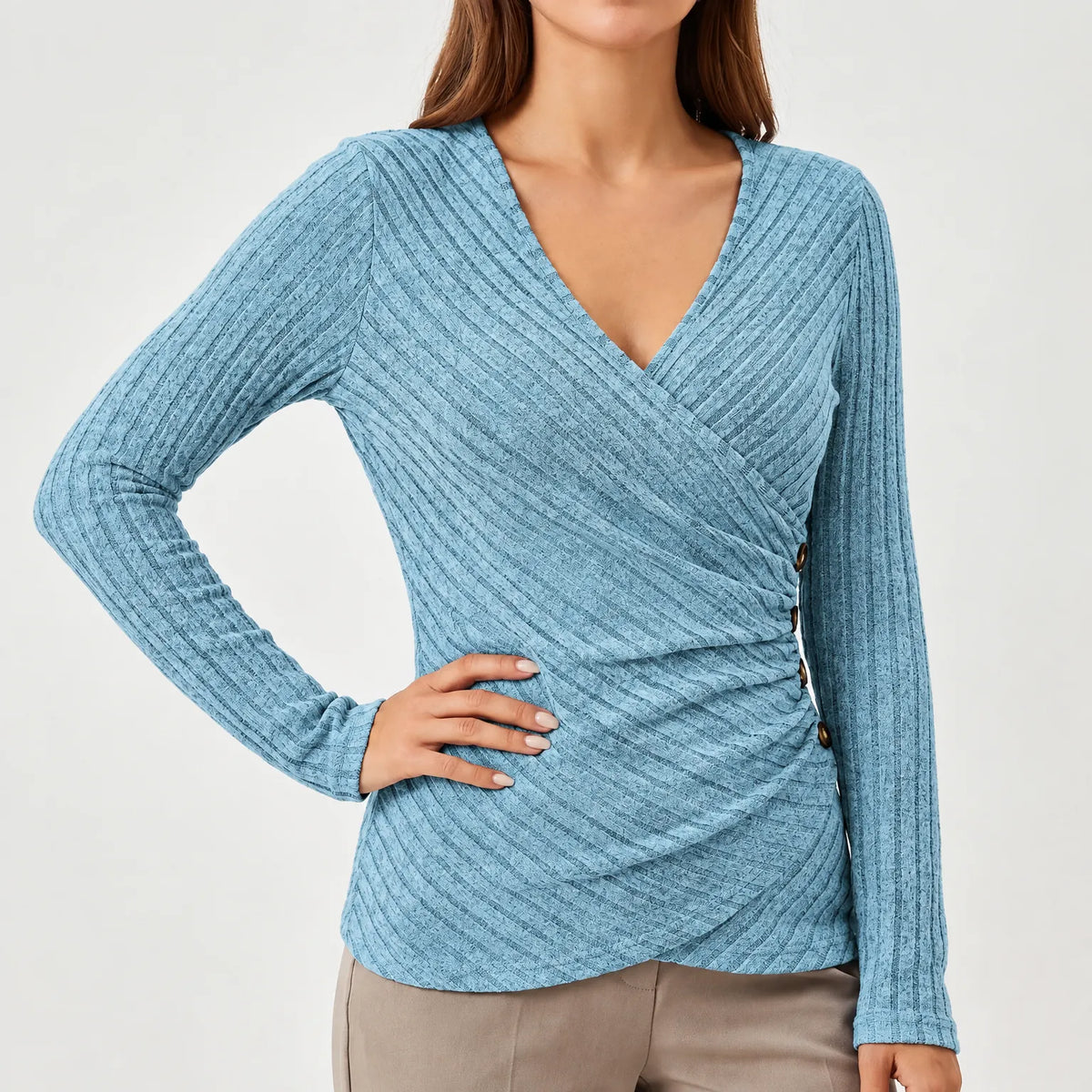 Women's ribbed wrap-front top with long sleeves, V-neckline and side buttons