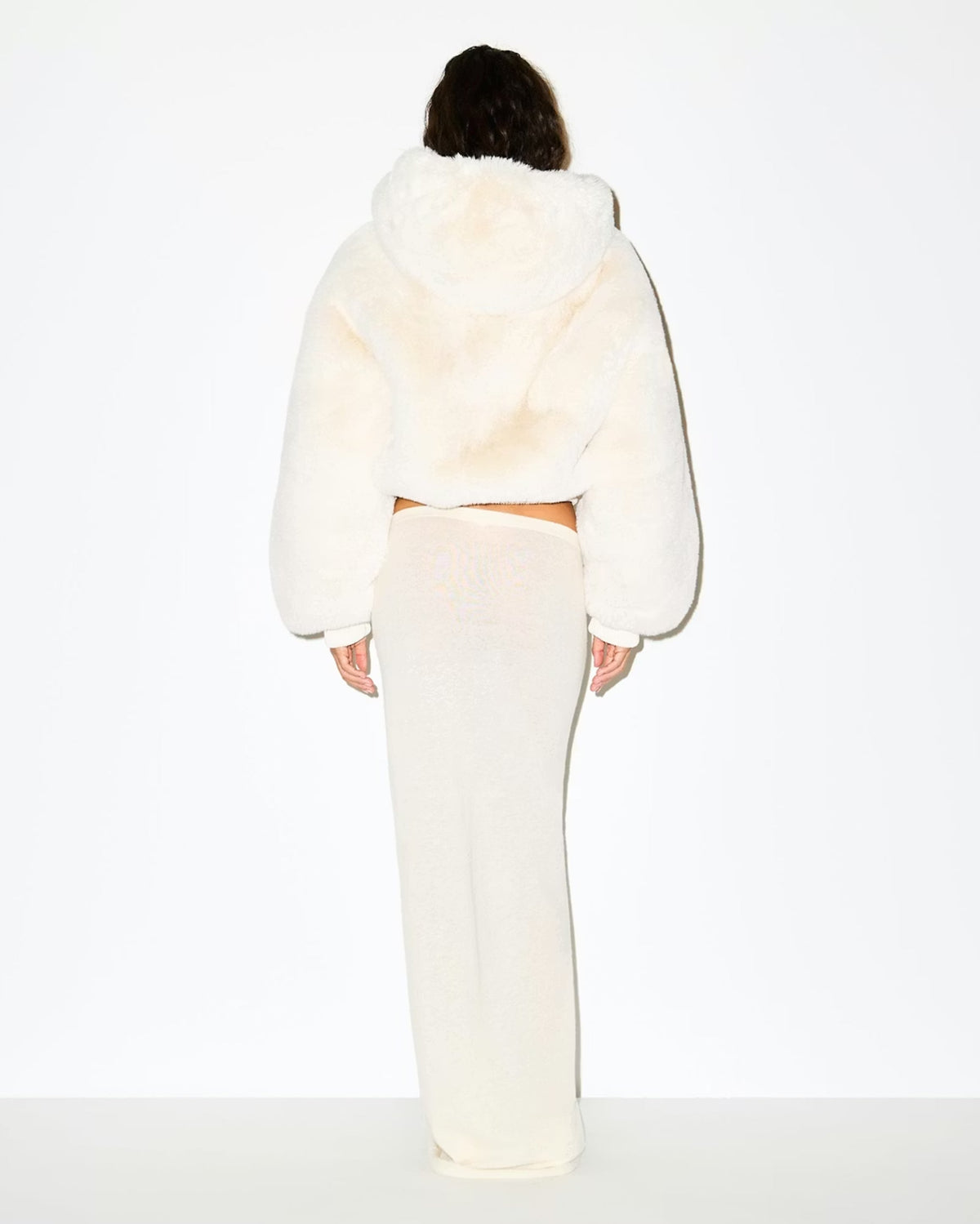Women's cropped faux fur jacket with hood and zip front