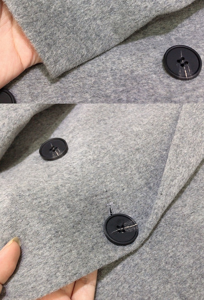 Women's long tailored coat with notched lapels and button front