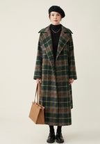 Women's green checked longline coat with notched lapels and tie belt
