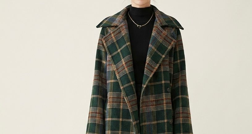 Women's green checked longline coat with notched lapels and tie belt