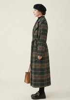 Women's green checked longline coat with notched lapels and tie belt