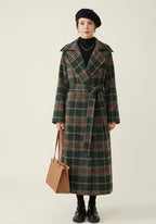 Women's green checked longline coat with notched lapels and tie belt