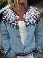 Women's blue cardigan with contrasting geometric pattern and button front