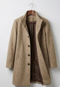 Women's long tailored coat with notched lapels, button front and welt pockets