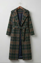 Women's green checked longline coat with notched lapels and tie belt
