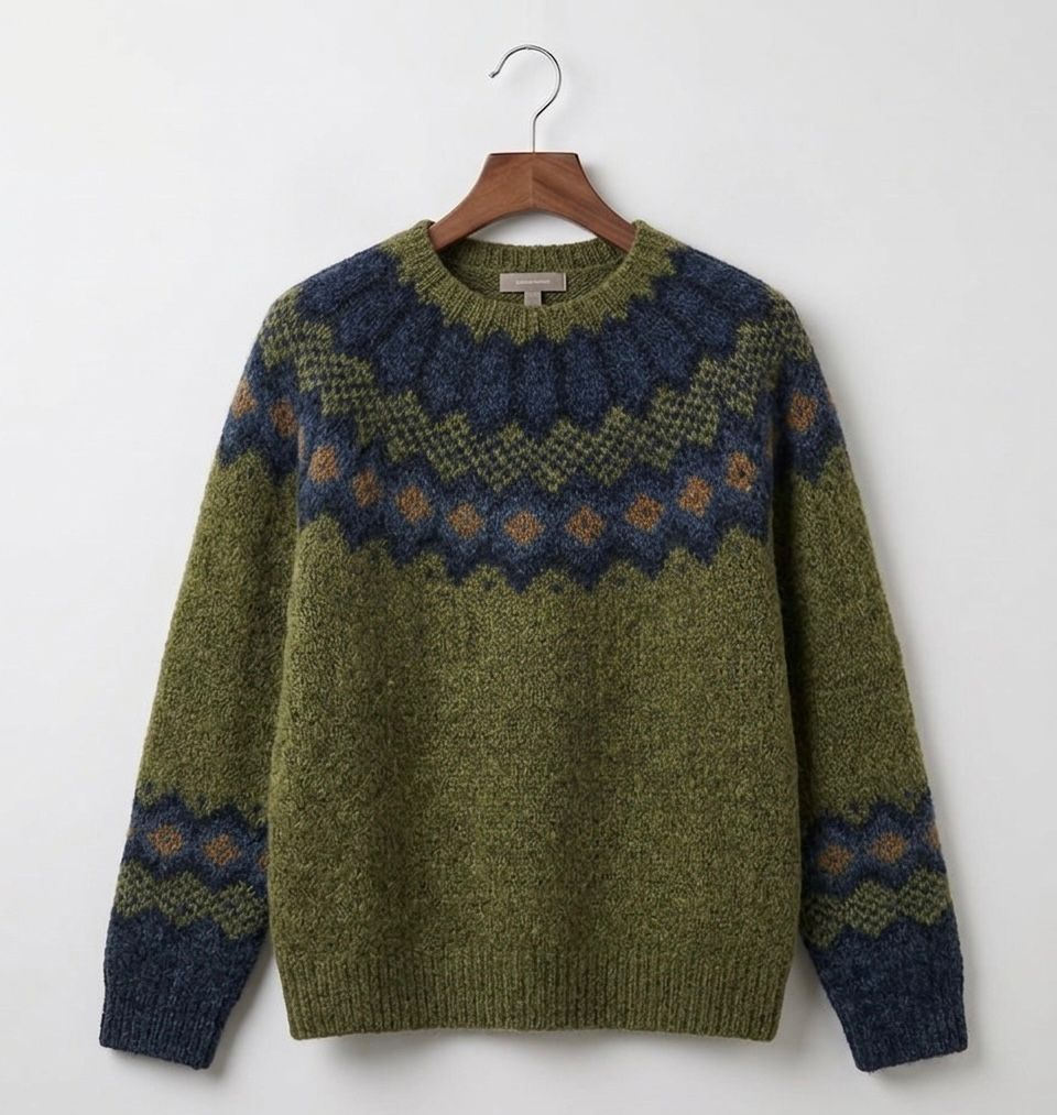 Green Nordic geometric knit jumper with navy and mustard pattern bands