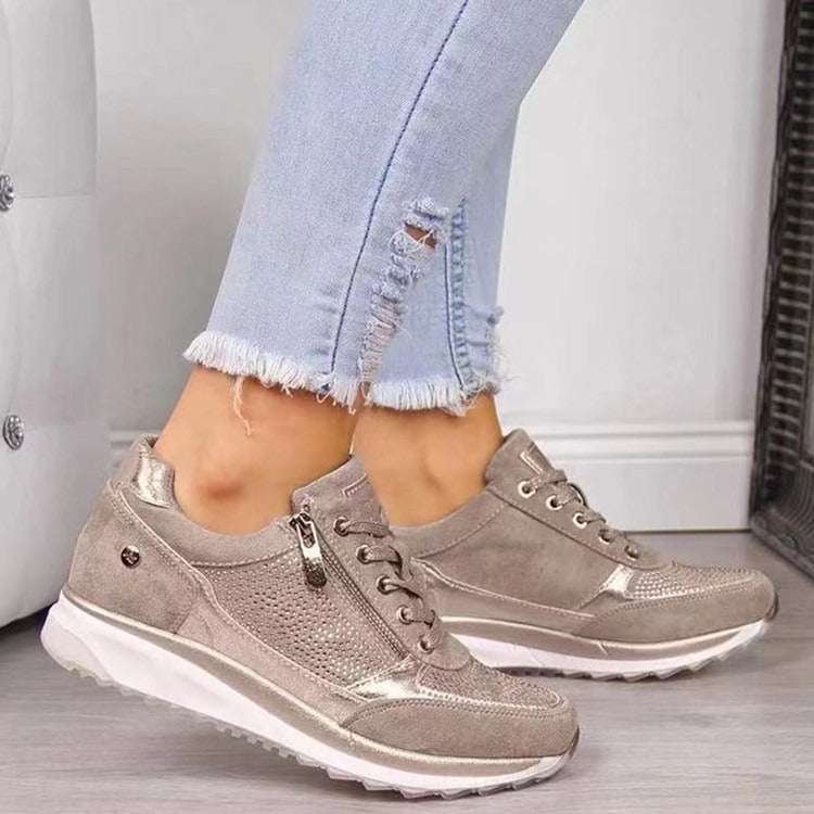 Women's low-top trainers with lace-up fronts, side zips, textured panels and flat ridged soles